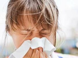 Woman suffering from allergies