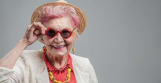 Hip older woman wearing sunglasses