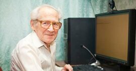 Older man at a computer
