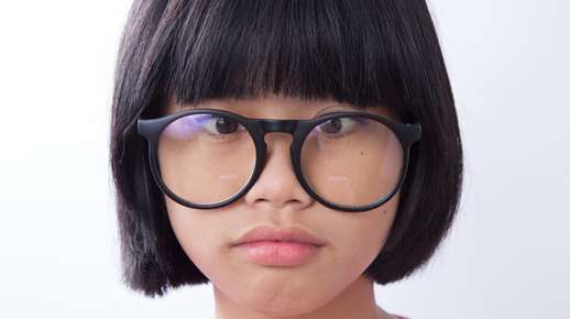 Girl glasses cross eyed