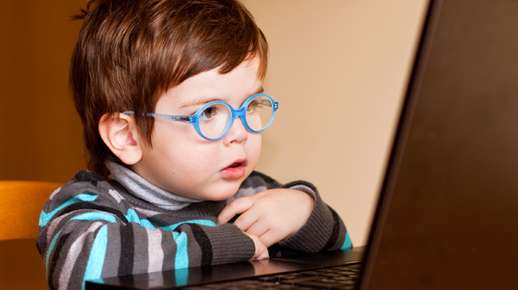 Boy glasses laptop