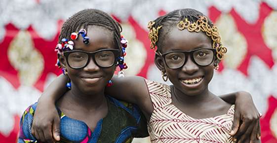 Young girls wearing glasses