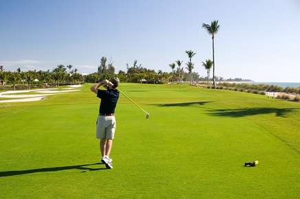 Man playing golf