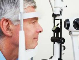 Older man having his eyes examined