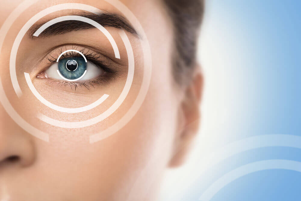 Woman with high-tech graphic over her eye