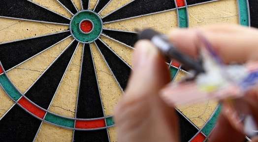 Throwing a dart at a dartboard