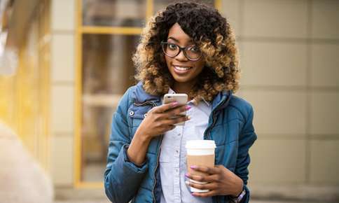 woman glasses phone outdoors